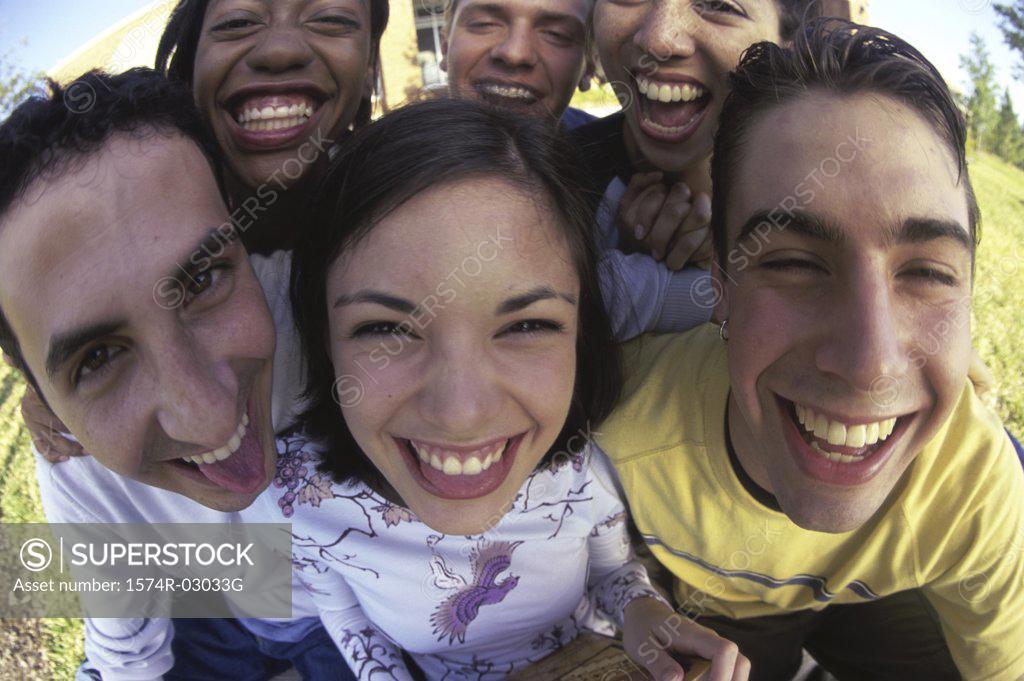 Stock Photo: 1574R-03033G Portrait of a group of teenagers smiling