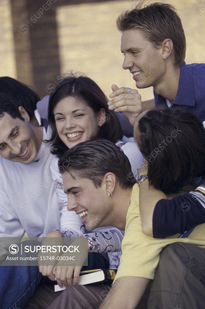 Stock Photo: 1574R-03034C Side profile of a group of teenagers smiling