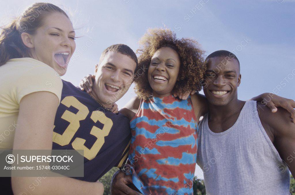 Stock Photo: 1574R-03040C Portrait of two young couples smiling together