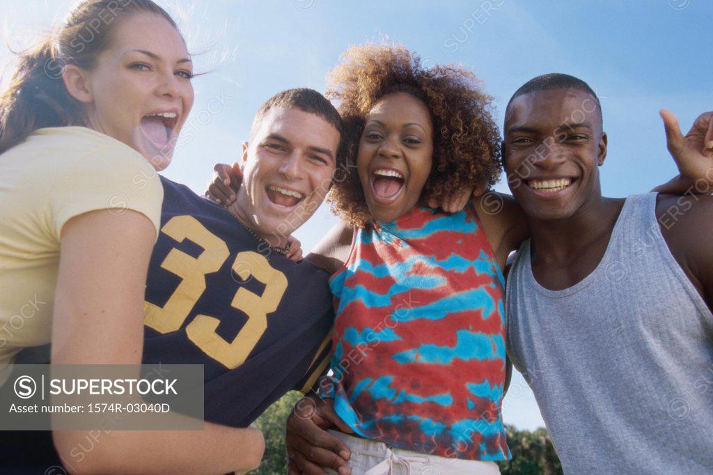Stock Photo: 1574R-03040D Portrait of two young couples smiling together