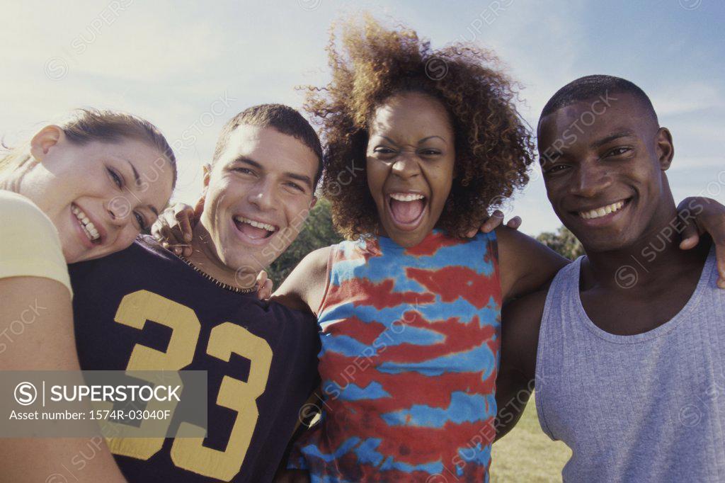 Stock Photo: 1574R-03040F Portrait of two young couples smiling together