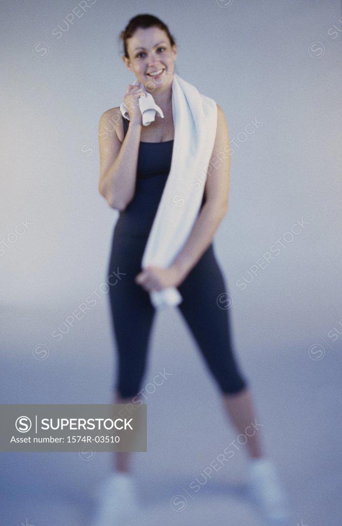 Stock Photo: 1574R-03510 Portrait of a young woman exercising
