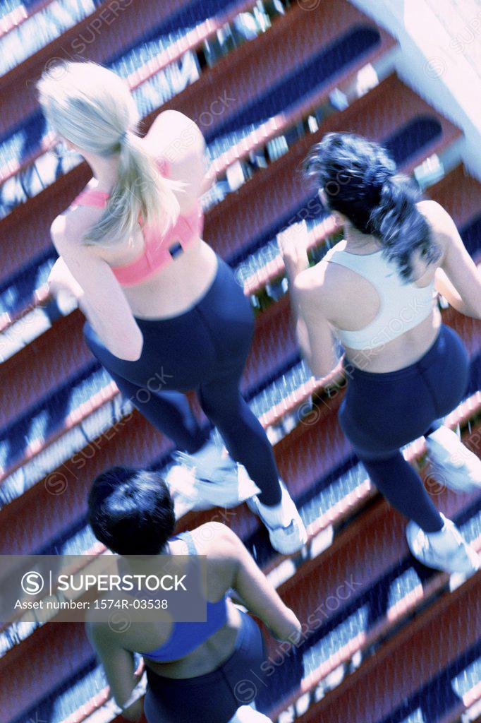 Stock Photo: 1574R-03538 High angle view of three young women jogging