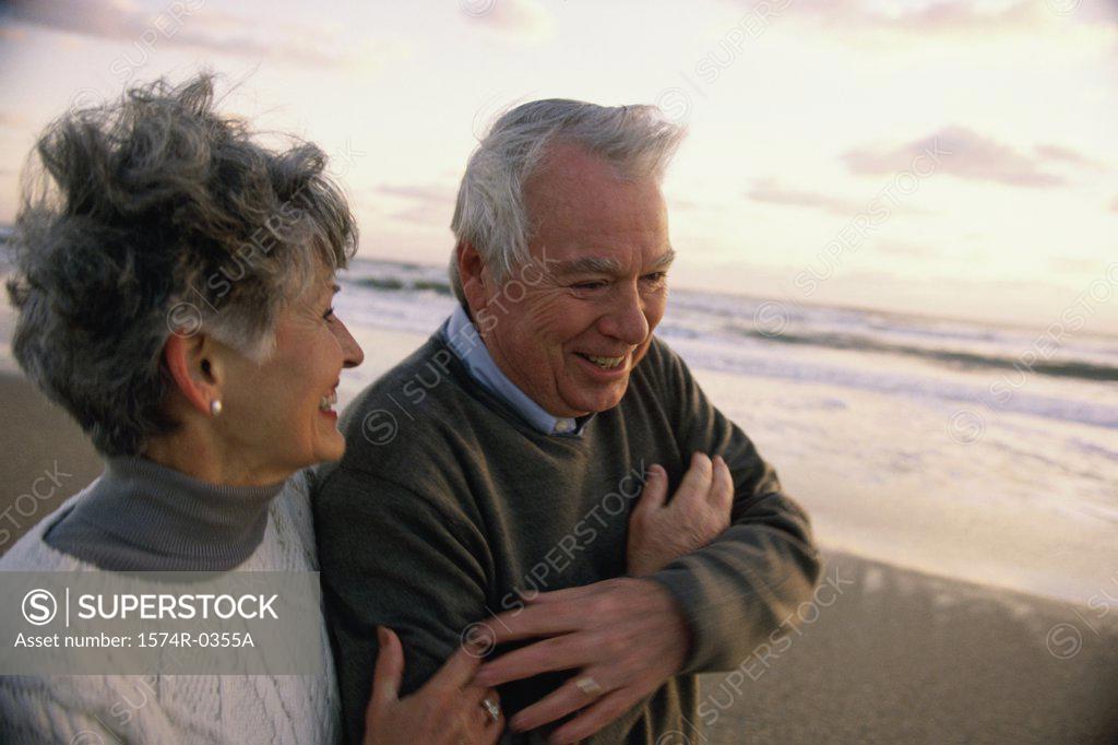 Stock Photo: 1574R-0355A Senior couple on the beach