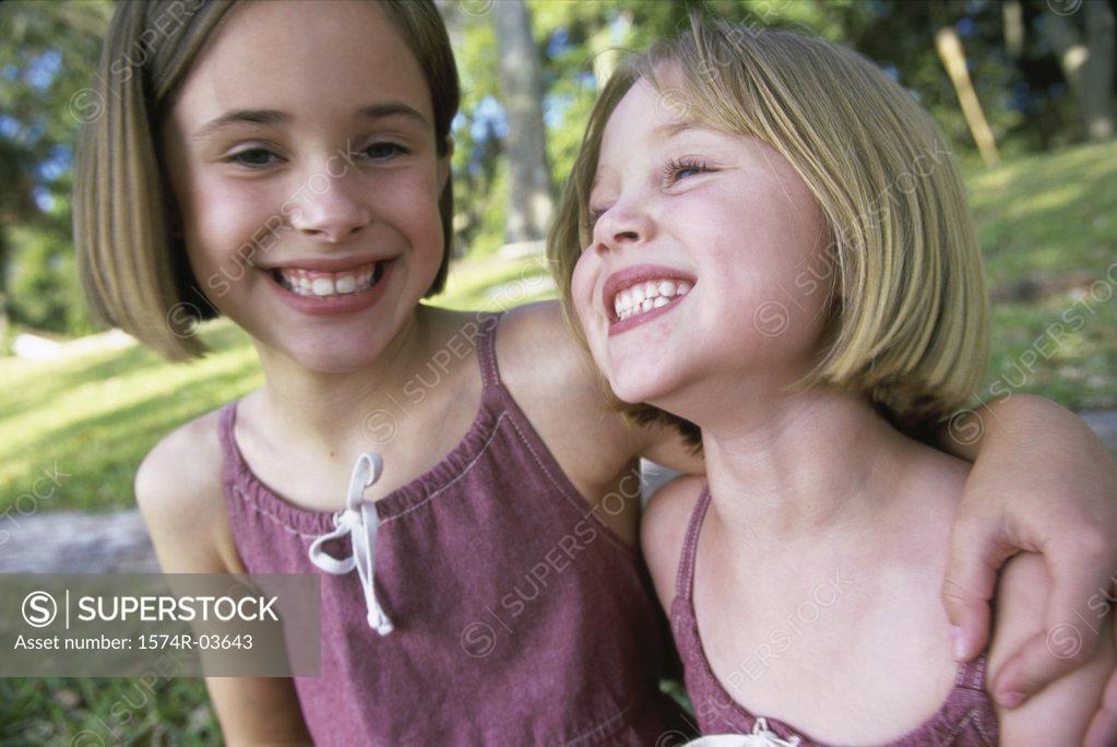 Stock Photo: 1574R-03643 Close-up of two girls smiling