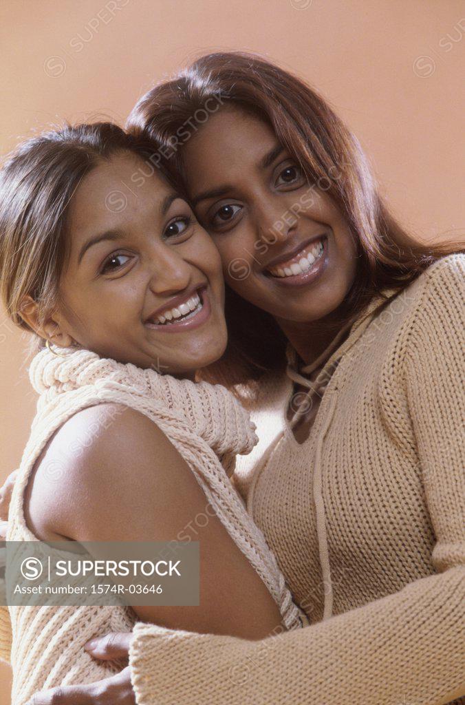 Stock Photo: 1574R-03646 Portrait of two teenage girls smiling