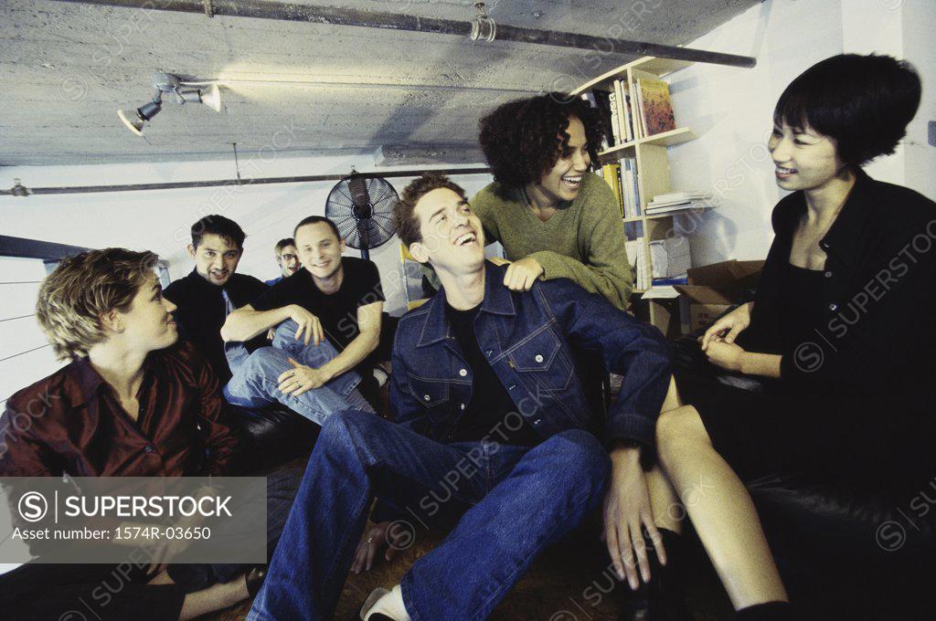 Stock Photo: 1574R-03650 Group of young people sitting in a room
