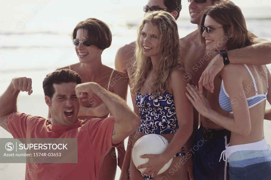 Stock Photo: 1574R-03653 Group of young couples on the beach