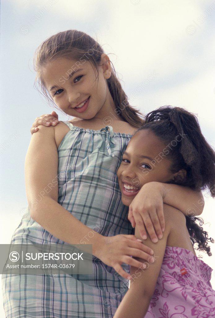 Stock Photo: 1574R-03679 Portrait of two girls smiling