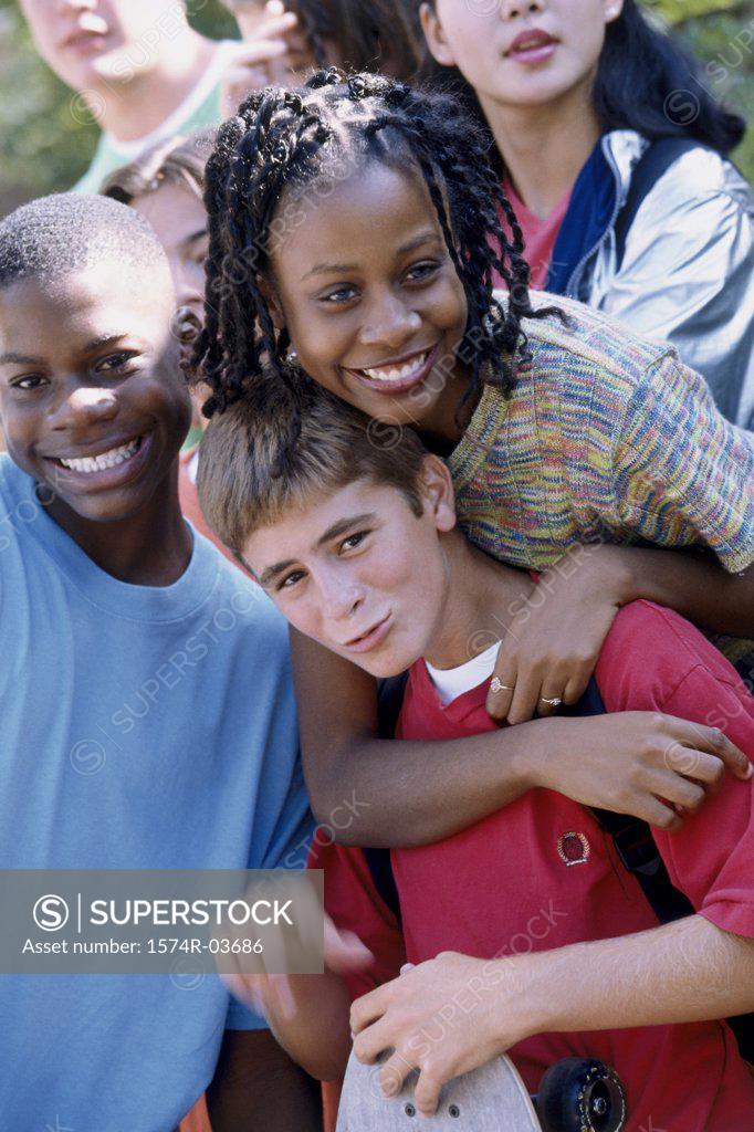 Stock Photo: 1574R-03686 Portrait of a group of teenagers smiling