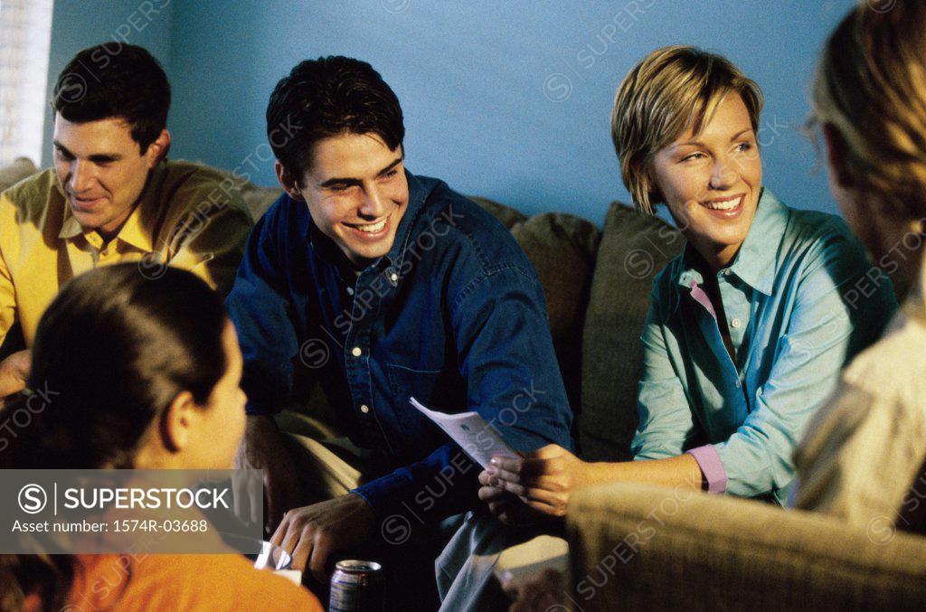 Stock Photo: 1574R-03688 Group of teenagers sitting together