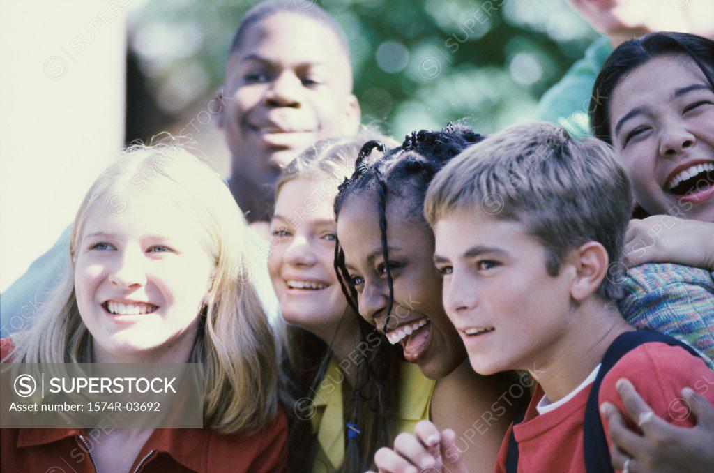 Stock Photo: 1574R-03692 Close-up of a group of teenagers smiling