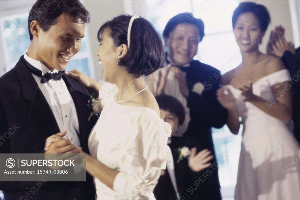 Stock Photo: 1574R-03806 Newlywed couple dancing at their wedding reception