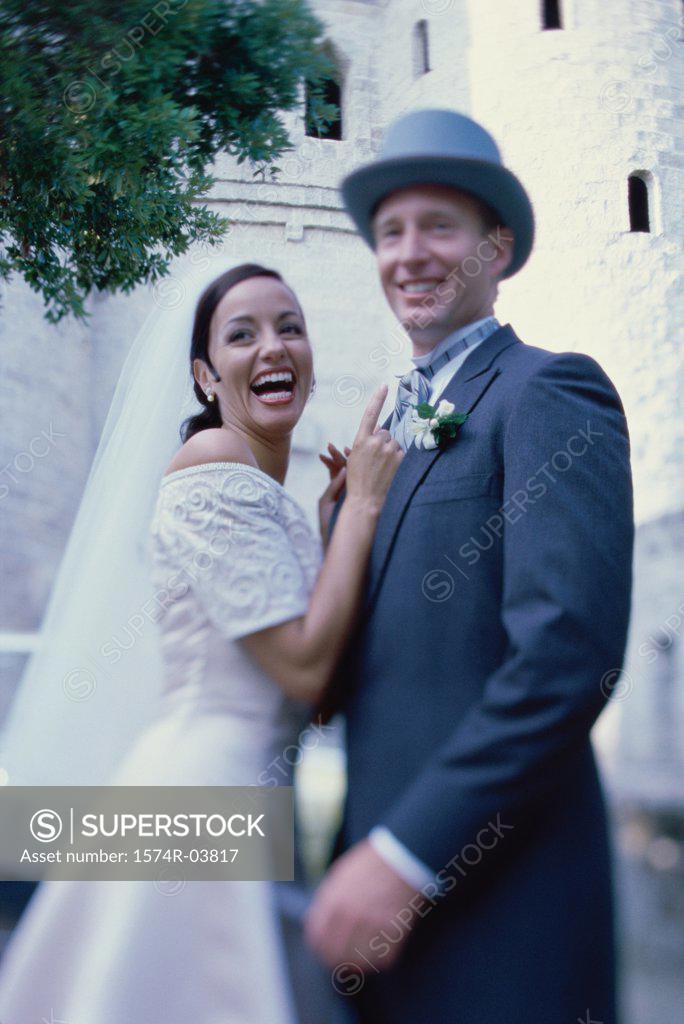 Stock Photo: 1574R-03817 Portrait of a newlywed couple smiling