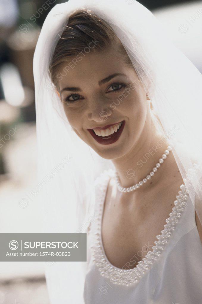 Stock Photo: 1574R-03823 Portrait of a bride smiling