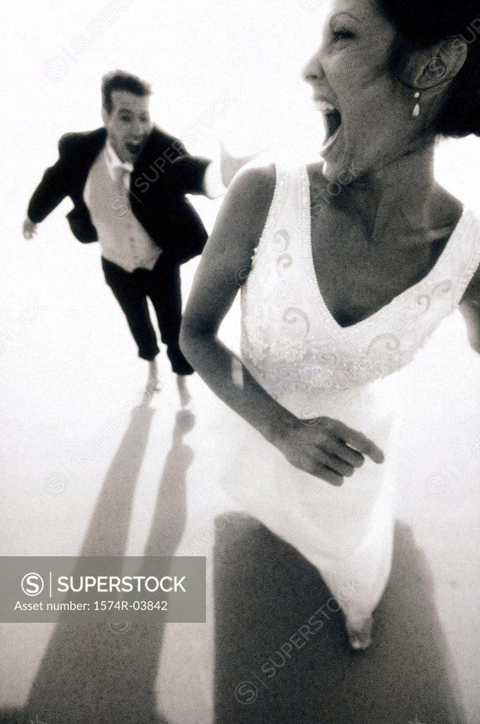 Stock Photo: 1574R-03842 High angle view of a newlywed couple on the beach