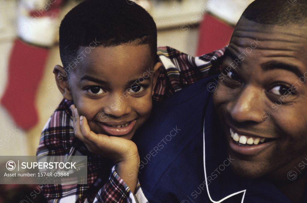Stock Photo: 1574R-03844 Portrait of a father and son smiling