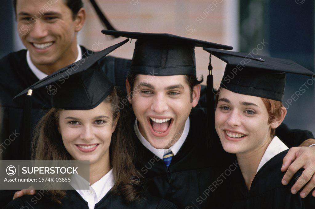Stock Photo: 1574R-03855 Portrait of a group of college students wearing graduation outfits