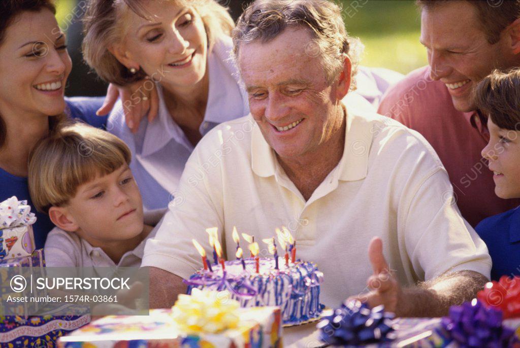 Stock Photo: 1574R-03861 Family celebrating a birthday party