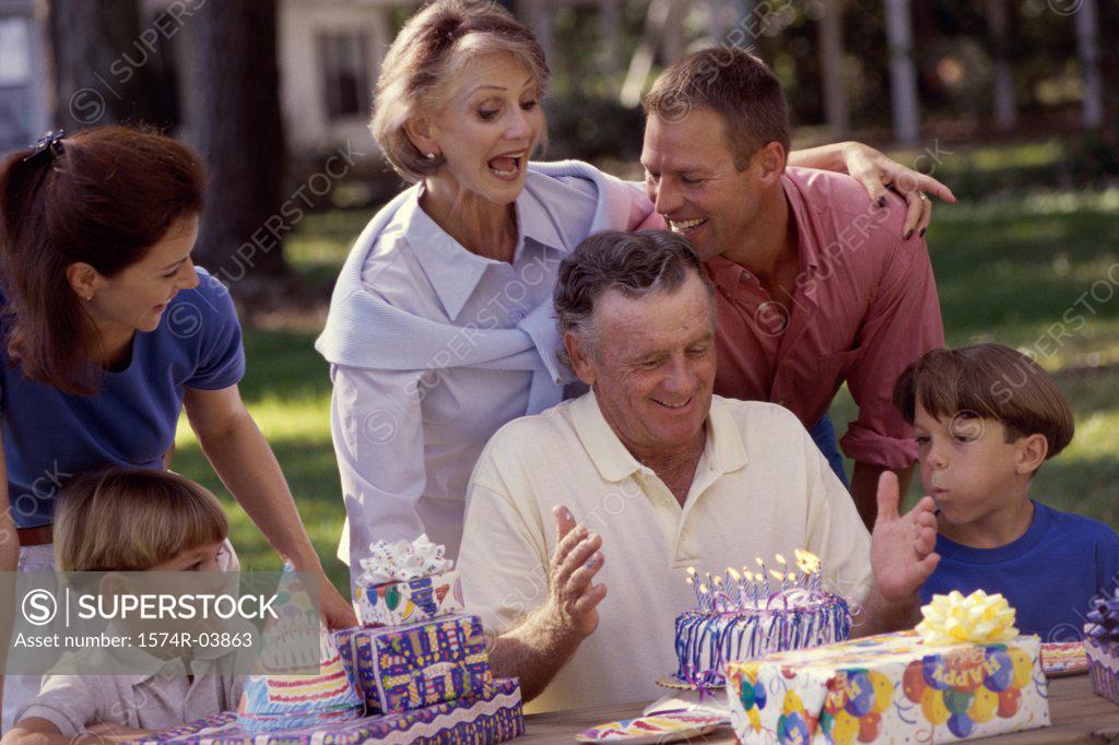Stock Photo: 1574R-03863 Family celebrating a birthday party