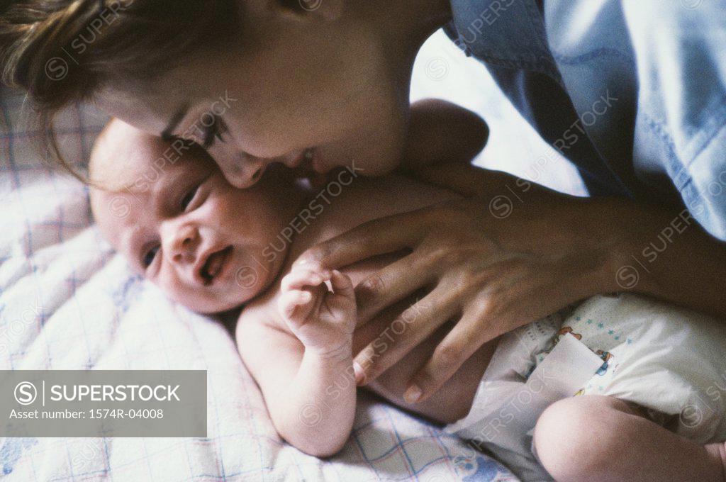 Stock Photo: 1574R-04008 Close-up of a mother kissing her baby boy