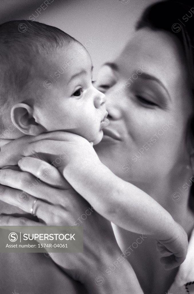 Stock Photo: 1574R-04061 Close-up of a mother kissing her baby boy