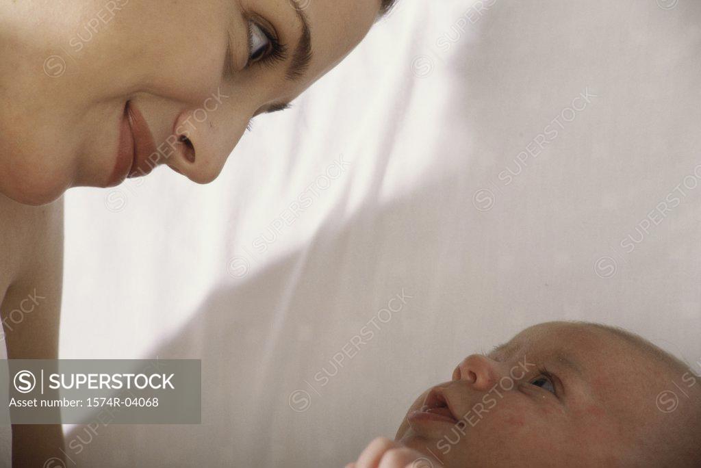 Stock Photo: 1574R-04068 Close-up of a mother holding her baby boy