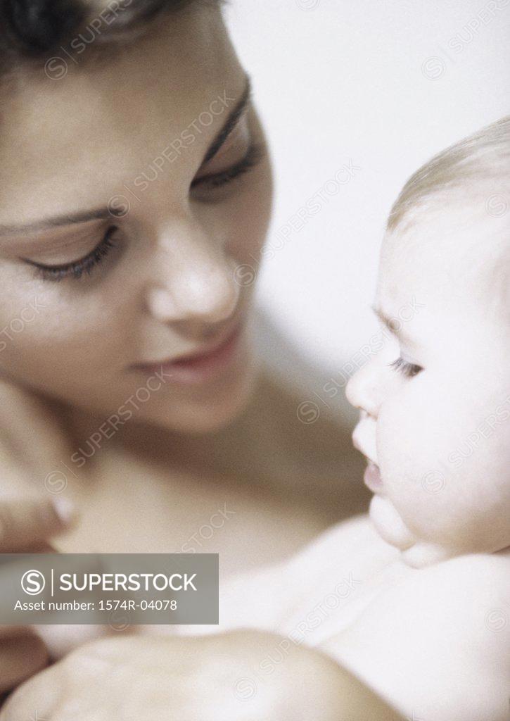 Stock Photo: 1574R-04078 Close-up of a mother holding her baby boy