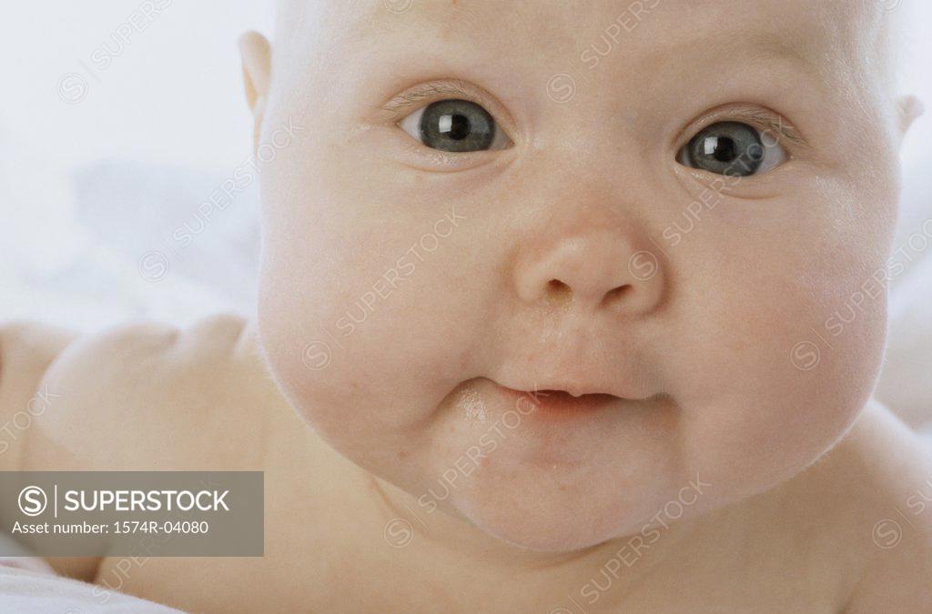 Stock Photo: 1574R-04080 Close-up of a baby boy smiling