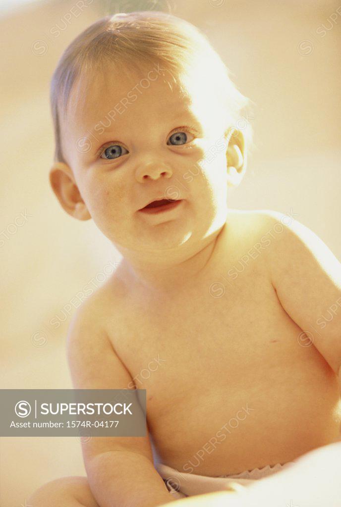 Stock Photo: 1574R-04177 Portrait of a baby boy sitting