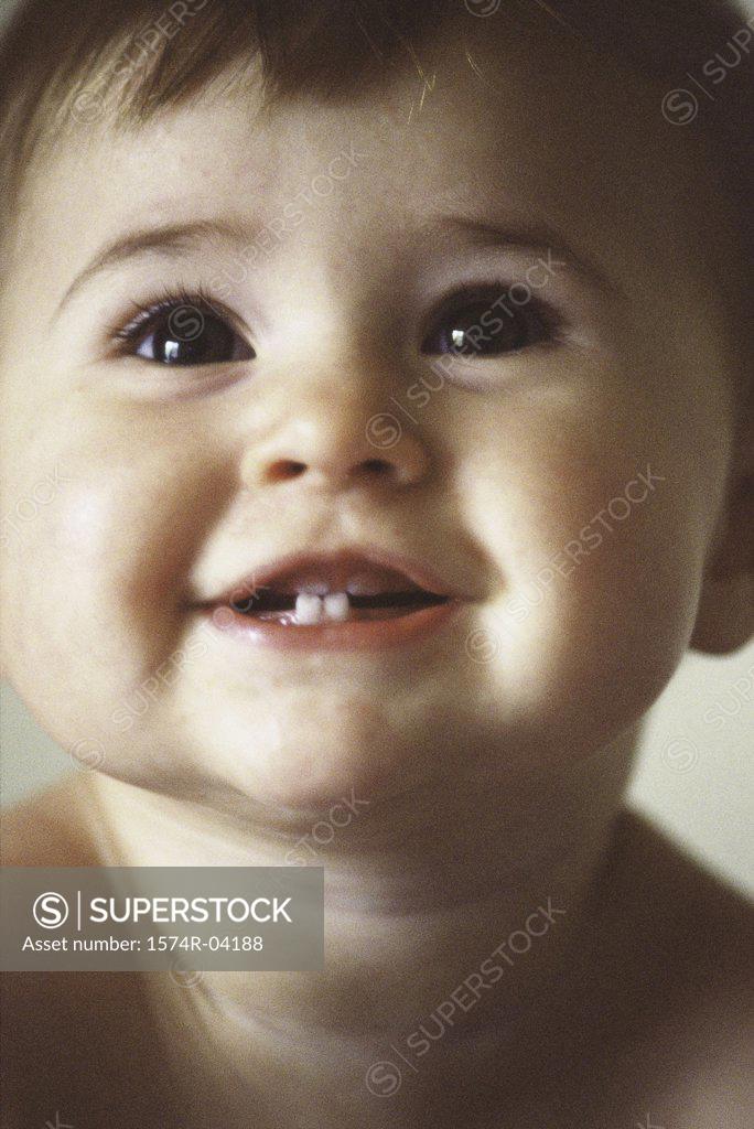 Stock Photo: 1574R-04188 Close-up of a baby boy smiling