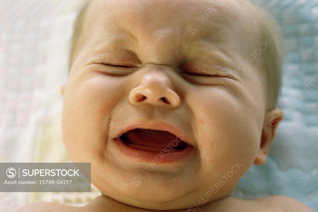 Stock Photo: 1574R-04197 Close-up of a baby boy crying