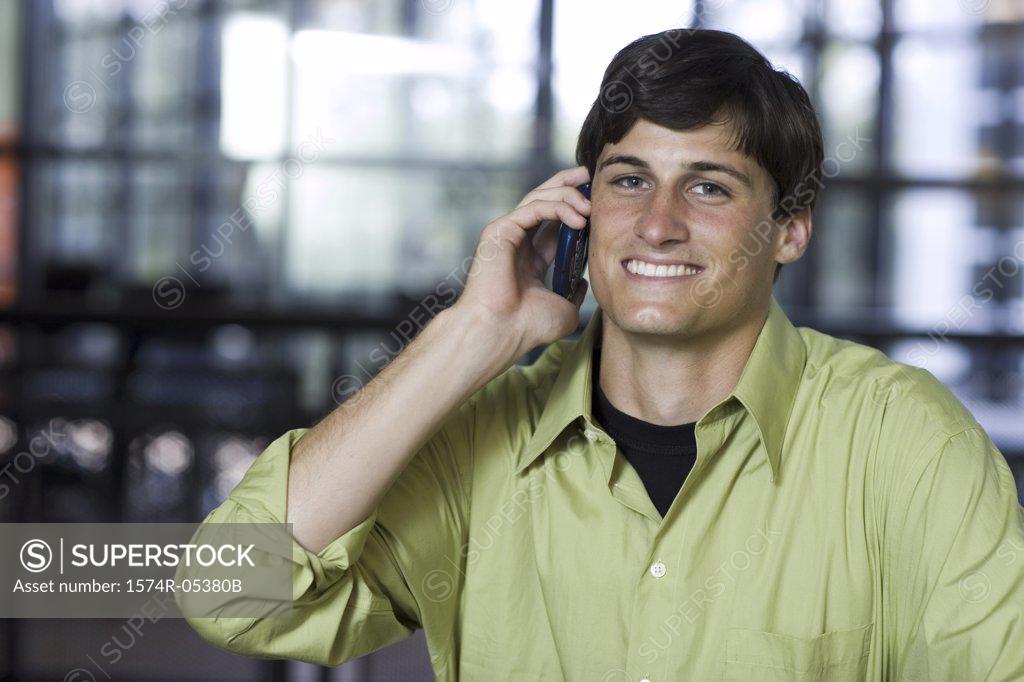 Stock Photo: 1574R-05380B Portrait of a businessman talking on a mobile phone