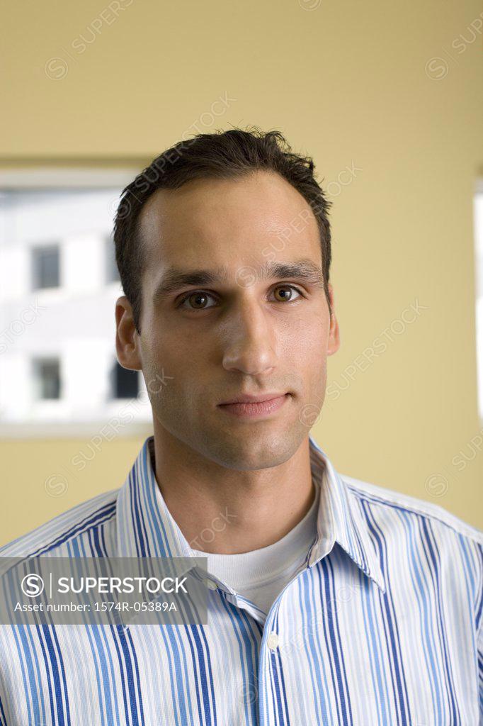 Stock Photo: 1574R-05389A Portrait of a businessman in an office