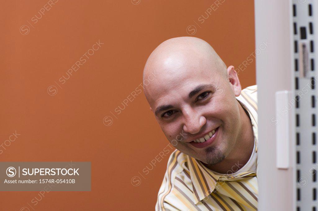 Stock Photo: 1574R-05410B Portrait of a businessman smiling in an office