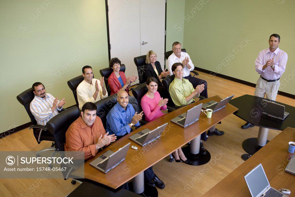 Stock Photo: 1574R-05467 High angle view of a group of business executives in a conference