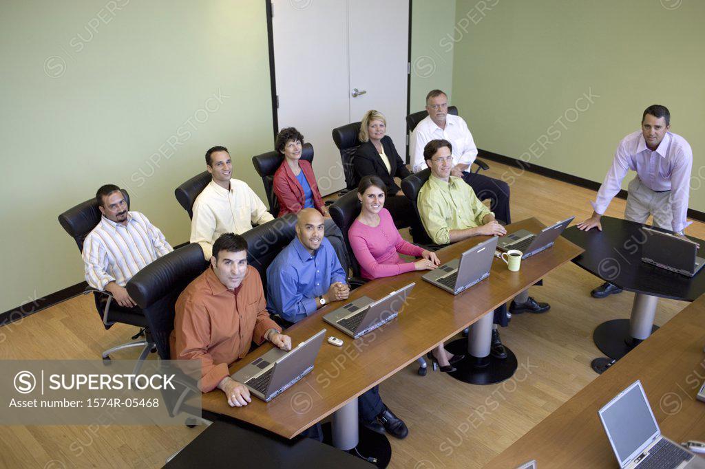 Stock Photo: 1574R-05468 High angle view of a group of business executives in a conference