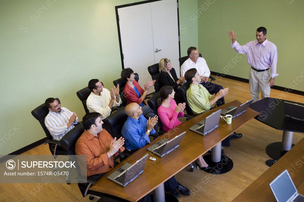 Stock Photo: 1574R-05470 High angle view of a group of business executives in a conference