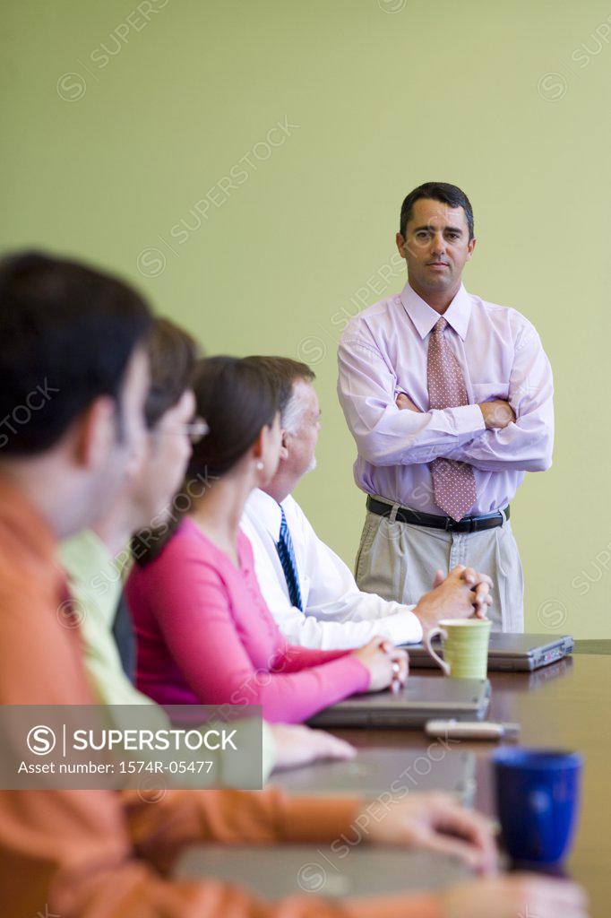 Stock Photo: 1574R-05477 Group of business executives in a conference