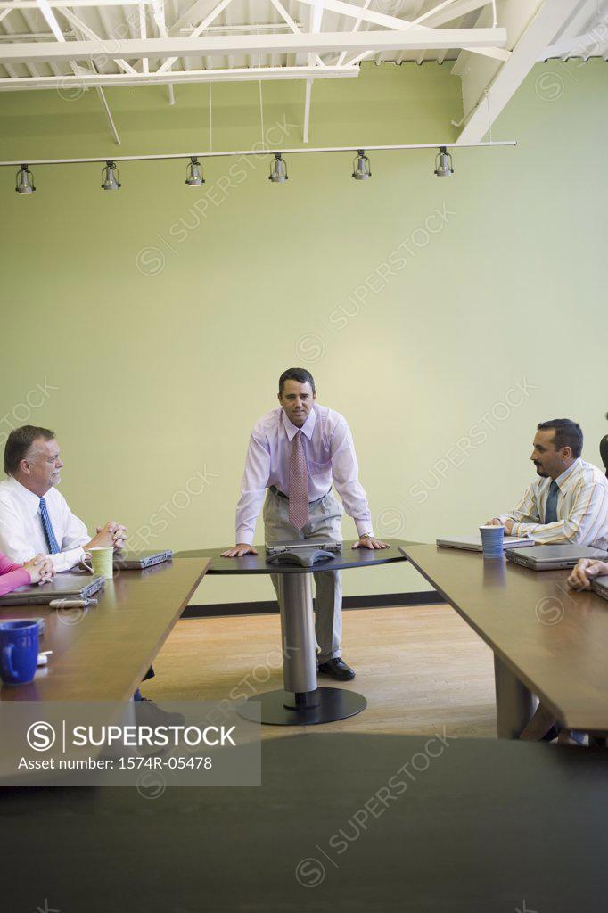 Stock Photo: 1574R-05478 Group of business executives in a conference