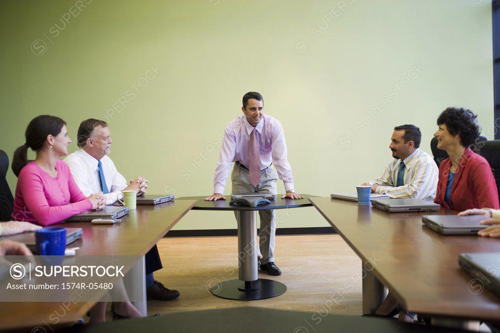 Stock Photo: 1574R-05480 Group of business executives in a conference