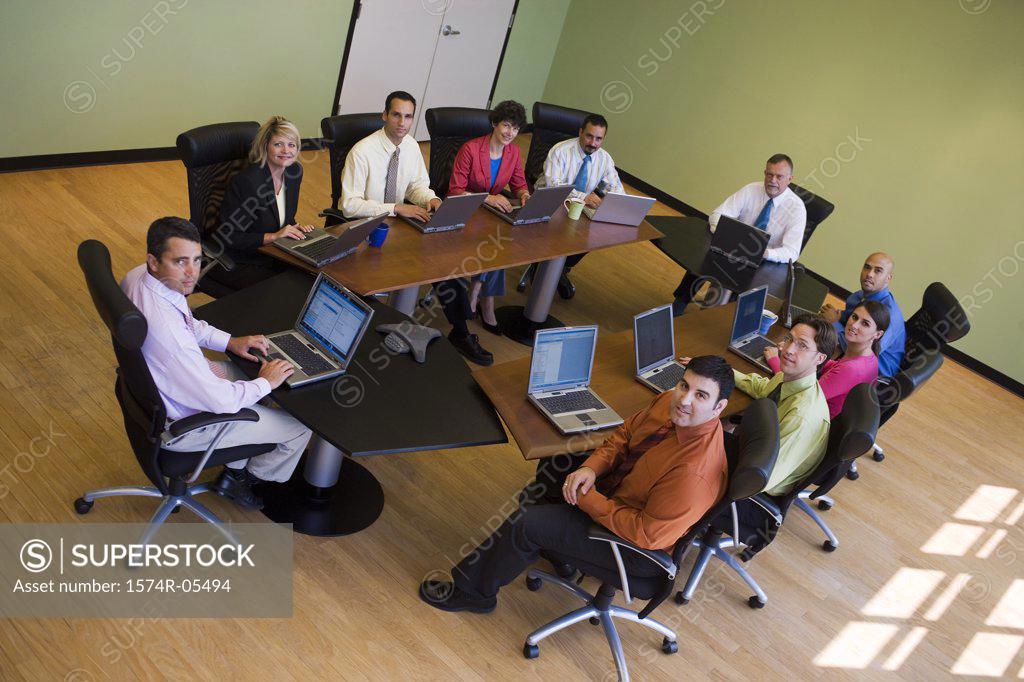 Stock Photo: 1574R-05494 Portrait of a group of business executives in a conference