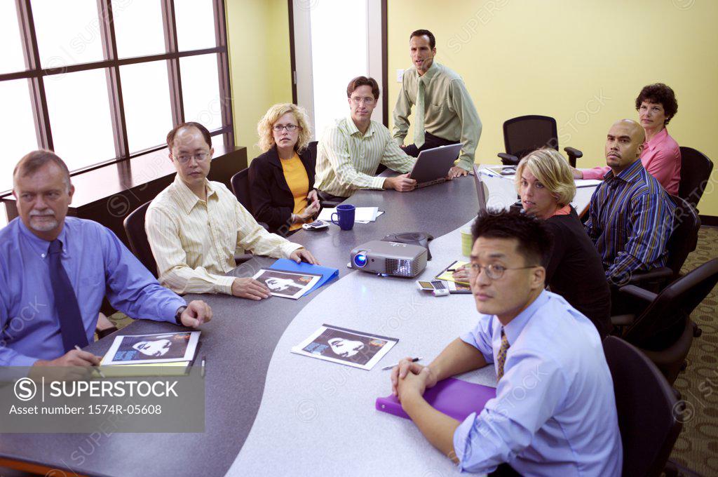 Stock Photo: 1574R-05608 High angle view of a group of business executives in a conference