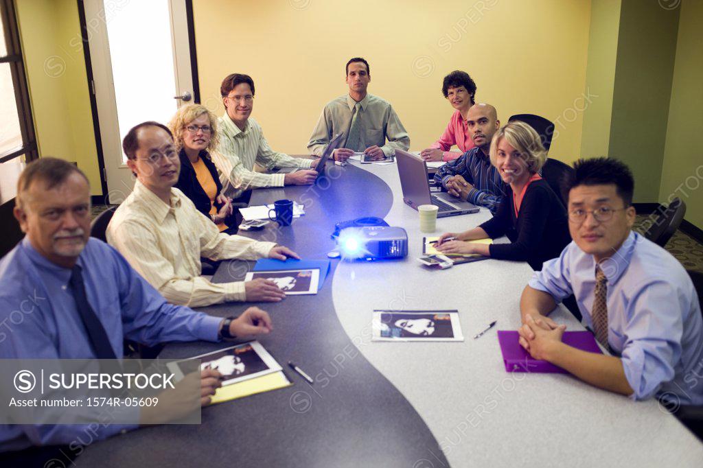 Stock Photo: 1574R-05609 Portrait of a group of business executives in a conference