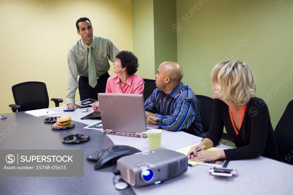 Stock Photo: 1574R-05615 Group of business executives in a conference