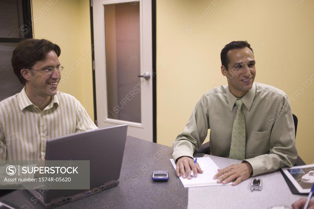 Stock Photo: 1574R-05620 Two businessmen in a conference