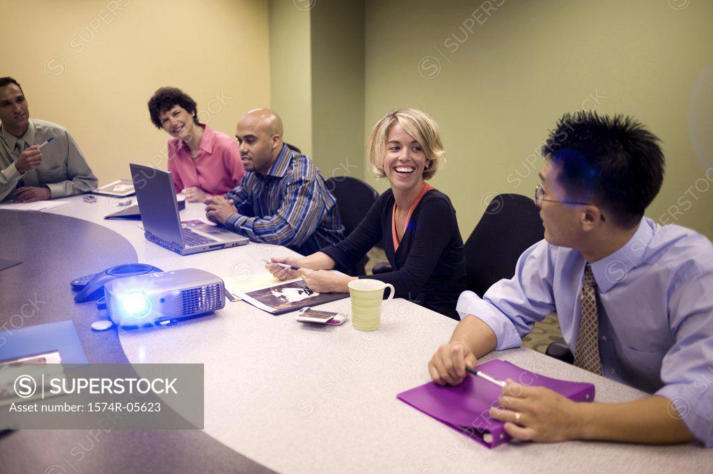 Stock Photo: 1574R-05623 Group of business executives in a conference