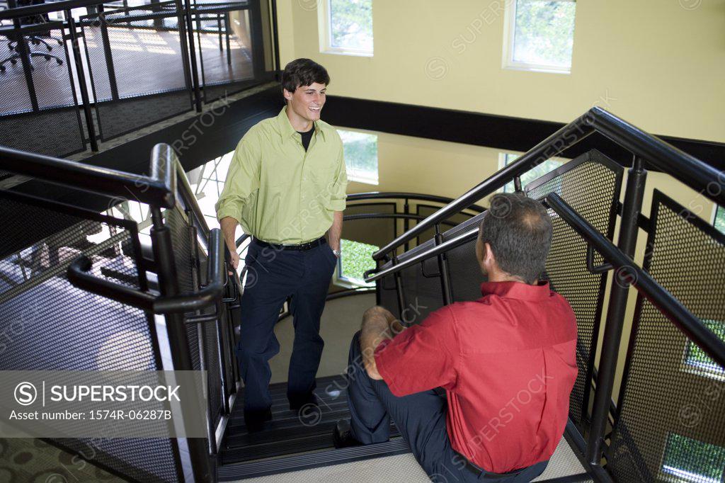 Stock Photo: 1574R-06287B High angle view of two businessmen on a staircase