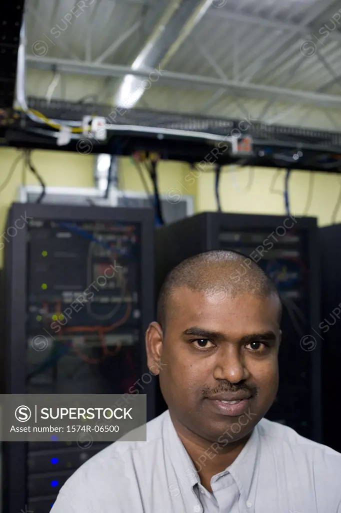 Portrait of a technician in a server room