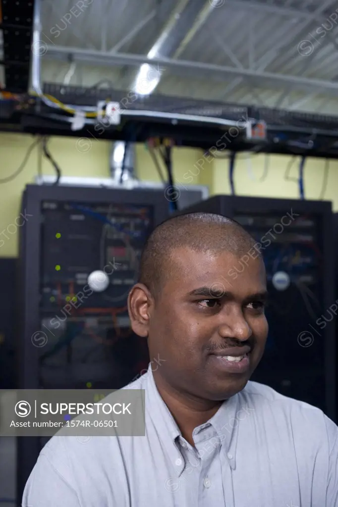 Close-up of a technician in a server room
